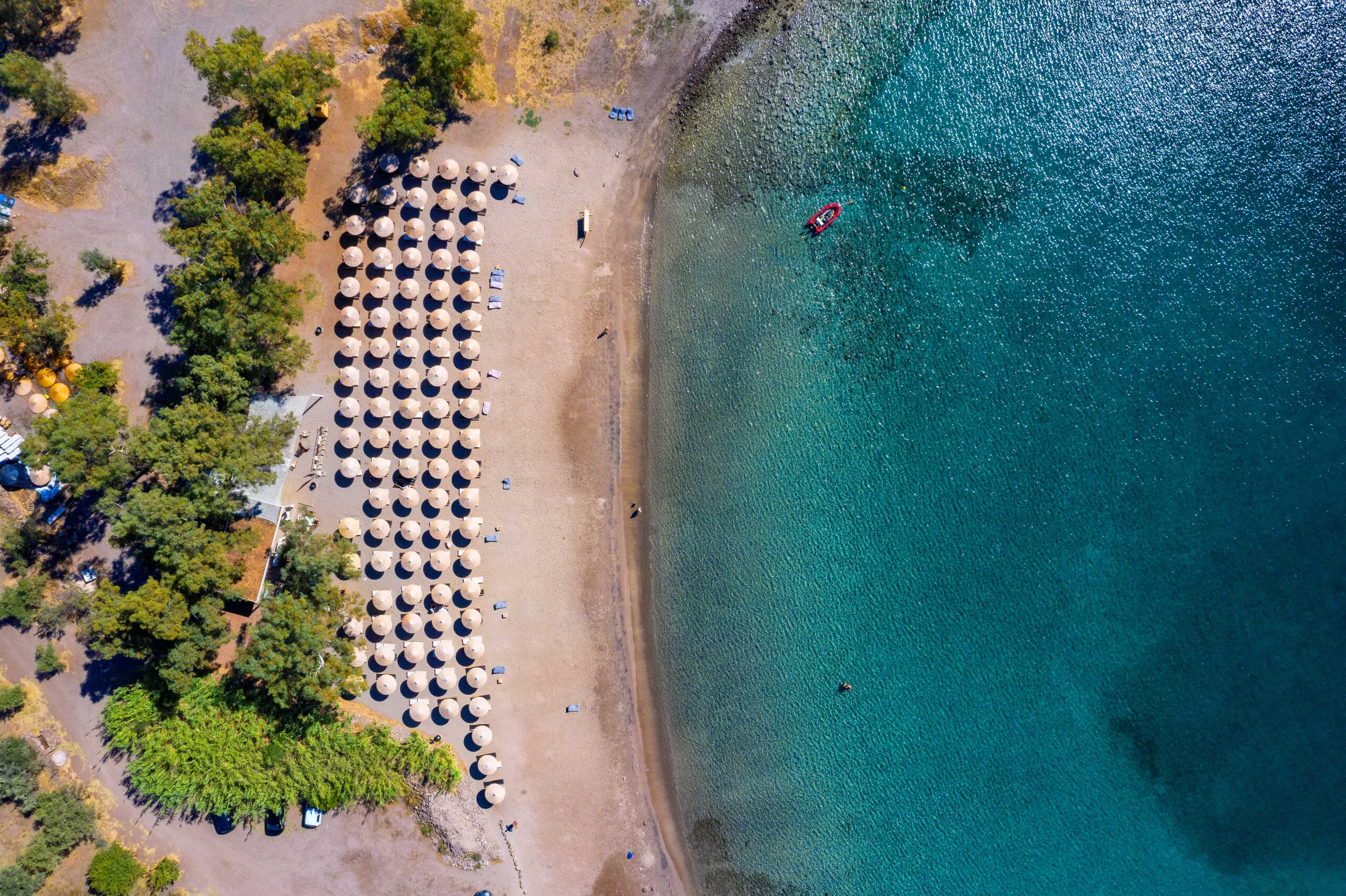 Aerial top down view to the popular beach of Klima kleidi with turquoise sea on the island of Aegina, Greece